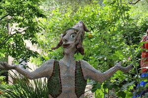 Figures and statues for children in the city park. photo