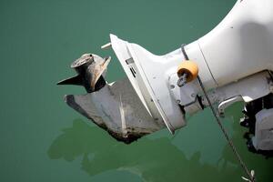 The propeller of a motor boat at the pier in the seaport. photo
