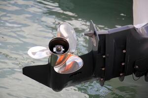 The propeller of a motor boat at the pier in the seaport. photo