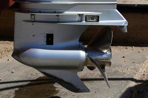 The propeller of a motor boat at the pier in the seaport. photo