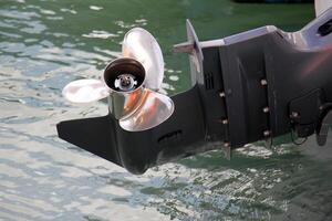 The propeller of a motor boat at the pier in the seaport. photo