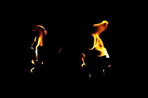 Fire flame texture. Burning material backdrop. Burn effect pattern. Blaze and torch wallpaper. Heat and haze backdrop. photo