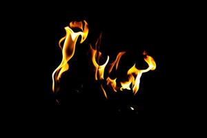 Fire flame texture. Burning material backdrop. Burn effect pattern. Blaze and torch wallpaper. Heat and haze backdrop. photo
