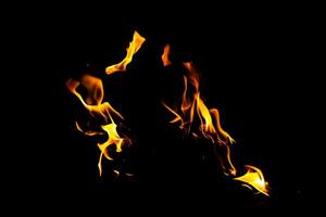 Fire flame texture. Burning material backdrop. Burn effect pattern. Blaze and torch wallpaper. Heat and haze backdrop. photo