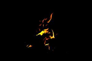 Fire flame texture. Burning material backdrop. Burn effect pattern. Blaze and torch wallpaper. Heat and haze backdrop. photo