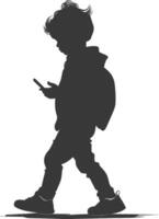 silhouette little boy walking while playing on smartphone black color only vector