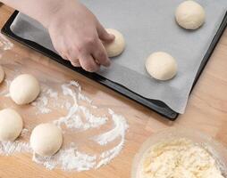 ring of dough with quark in the middle. baking at home, Ball dough with cottage cheese photo