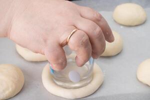 ring of dough with quark in the middle. baking at home, Ball dough with cottage cheese photo