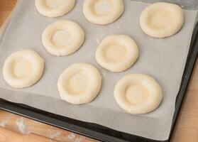 ring of dough with quark in the middle. baking at home, Ball dough with cottage cheese photo