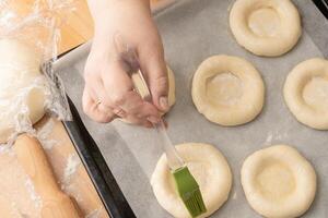 ring of dough with quark in the middle. baking at home, Ball dough with cottage cheese photo