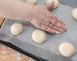 ring of dough with quark in the middle. baking at home, Ball dough with cottage cheese photo