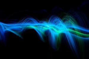 Blue Light wave of energy with elegant glowing lines. Abstract technology background. photo