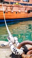 Moored Ship Using Rope and Mooring Knot, Symbol of Serenity and Protection. photo