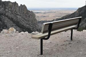 Looking Past an Empty Bench at Continental Divide Overlook near Boulder, CO photo