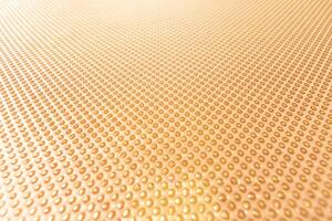 texture of the fabric, side, background of fabric in the highlight. golden color photo
