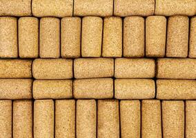 Background from textured wine corks, top view. place for text photo