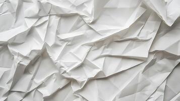 Abstract folded and crumpled white paper texture photo