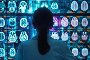 Confident female doctor looking to examining and analyzing brain scan on monitor hologram display. For futuristic medical and health care technology concept. photo