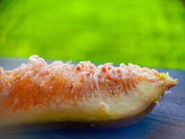 Fresh fig fruit pulp macro soft focus close up. Organic food beautiful background. Harvesting figs. Shallow depth of field fruit texture. High quality photo