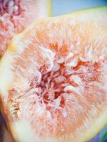 Fresh fig fruit pulp macro soft focus close up. Organic food beautiful background. Harvesting figs. Shallow depth of field fruit texture. High quality photo
