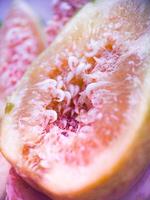 Fresh fig fruit pulp macro soft focus close up. Organic food beautiful background. Harvesting figs. Shallow depth of field fruit texture. High quality photo