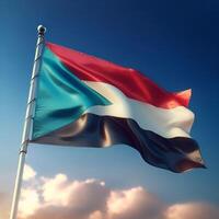 Proud Flutter of the Sudan Flag Against the Sky photo