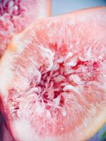 Fresh fig fruit pulp macro soft focus close up. Organic food beautiful background. Harvesting figs. Shallow depth of field fruit texture. High quality photo