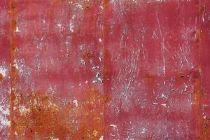 rusty red painted flat sheet metal surface full-frame background and texture photo