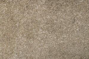 small gravel stucco wall finish texture and full-frame background photo