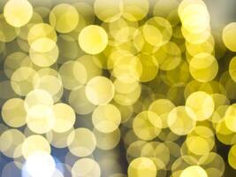 gold abstract background with bokeh defocused lights photo