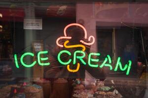Neon Ice Cream Sign in Green and Orange, Window Display View photo