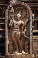 Ancient guardstone relief photo