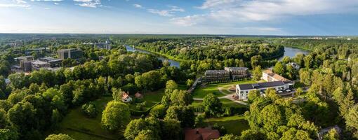 Aerial panoramic view of Lithuanian resort Druskininkai. Druskininkai in autumn colours, drone picture of multi coloured trees in most beautiful city of Druskininkai in Lithuania photo