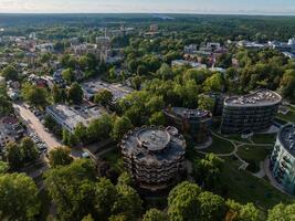 Aerial panoramic view of Lithuanian resort Druskininkai. Druskininkai in autumn colours, drone picture of multi coloured trees in most beautiful city of Druskininkai in Lithuania photo