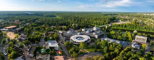 Aerial panoramic view of Lithuanian resort Druskininkai. Druskininkai in autumn colours, drone picture of multi coloured trees in most beautiful city of Druskininkai in Lithuania photo