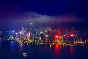 Aerial view of illuminated Hong Kong skyline. Hong Kong, China photo