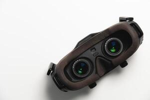 Virtual reality glasses for FPV drone pilots with antennas, controlling an unmanned aerial vehicle or quadcopter photo