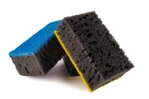 Multi-colored and black household sponges isolated on a white background. Sponge for washing dishes . photo
