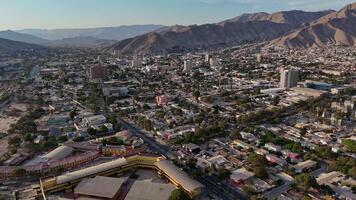 Aerial view of Copiapo in Chile with majestic mountains in distance urban life and natural beauty. Aerial view of Copiapo Chile towering mountains in background harmony between city and nature. video