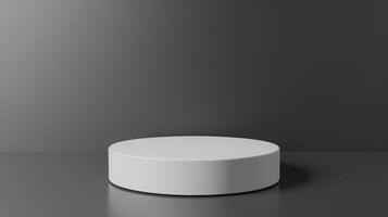 A minimalist round white pedestal is placed in front of a dark gray backdrop under soft studio lighting, creating a clean and modern presentation. photo