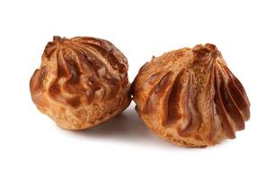 Two profiteroles isolated on a white background. Mini eclair on white. photo
