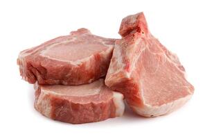 Three pork entrecote isolated on a white background. photo