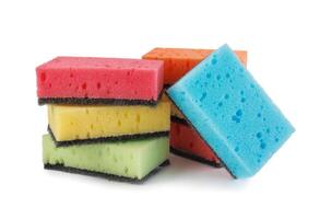 Several colored dishwashing sponges isolated on a white background. photo