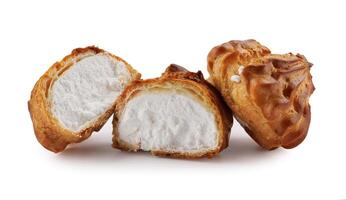 Cut in half and whole porophytole with white cream isolated on a white background. Eclair with cream. photo