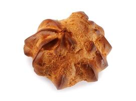Single profiterole isolated on a white background. Mini eclair on white. photo