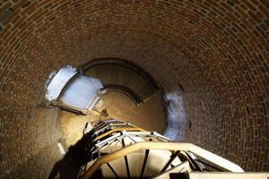 Ciechanow, Poland - June 8th, 2024 - Stairs inside round tower at Castle of the Masovian Dukes photo