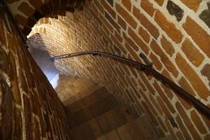Ciechanow, Poland - June 8th, 2024 - Stairs inside round tower at Castle of the Masovian Dukes photo