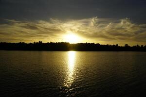 Sunset over Galve lake - Trakai, Lithuania photo