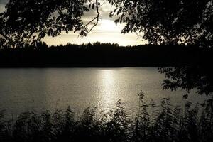 Sunset over Galve lake - Trakai, Lithuania photo