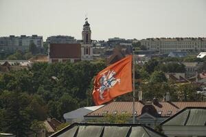 Vilnius, Lithuania - September 3th 2023 - Cityscape with flag photo